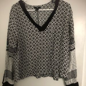 Black and white patterned blouse top